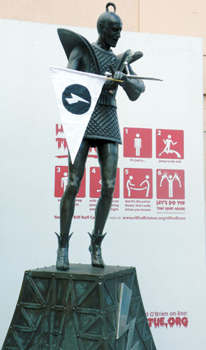 David White image of Riff Raff statue with flag